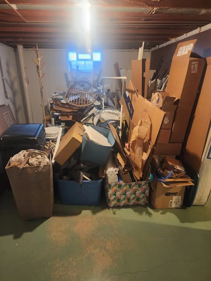 Roll-off dumpster container at job site for Cleanout Dumpster Rental in Ashland